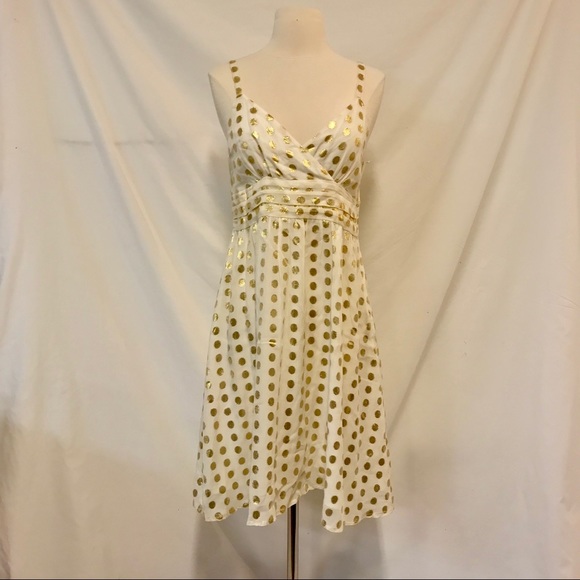 white dress with gold polka dots